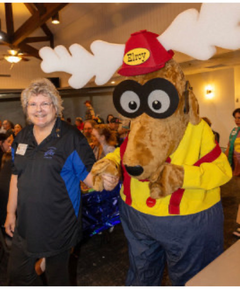 Elroy the Elk mascot greeting a guest at the Youth Week celebration